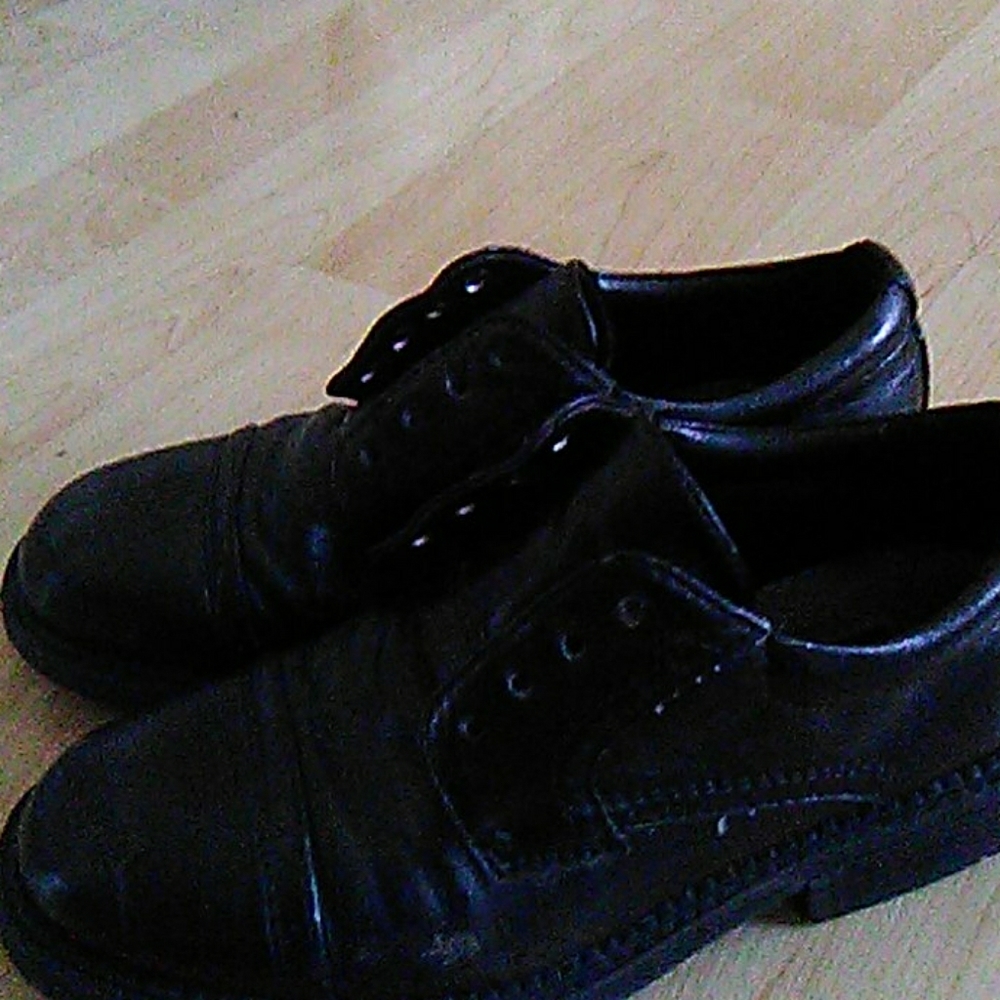 Black dress shoes for a kid